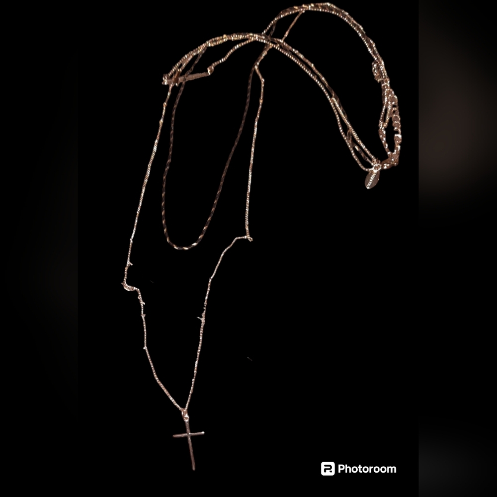 Express cross three layered strand necklace adjustable length